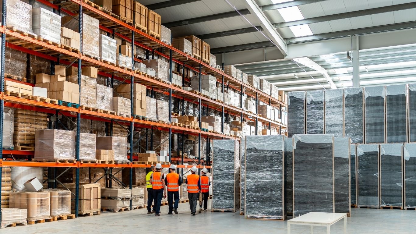 Procurement managers assessing a warehouse rack