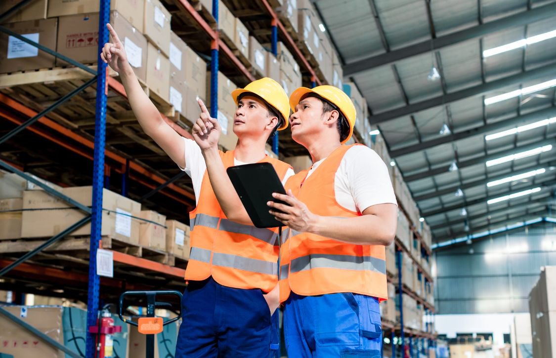 warehouse supervisors making sure there is fixed asset reconciliation on their records