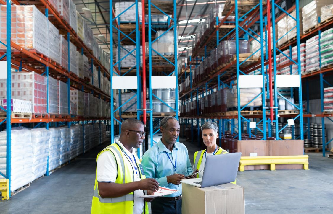 warehouse staff and warehouse supervisor using integrated distribution software